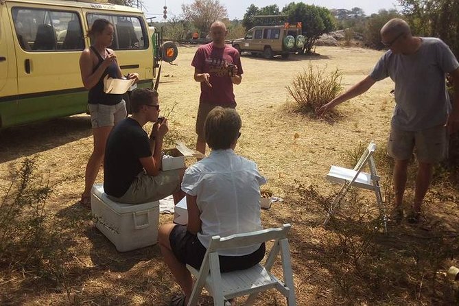 Airport Pick Up To Nairobi National Park / Drop Off - The open-roof van makes the game drive work