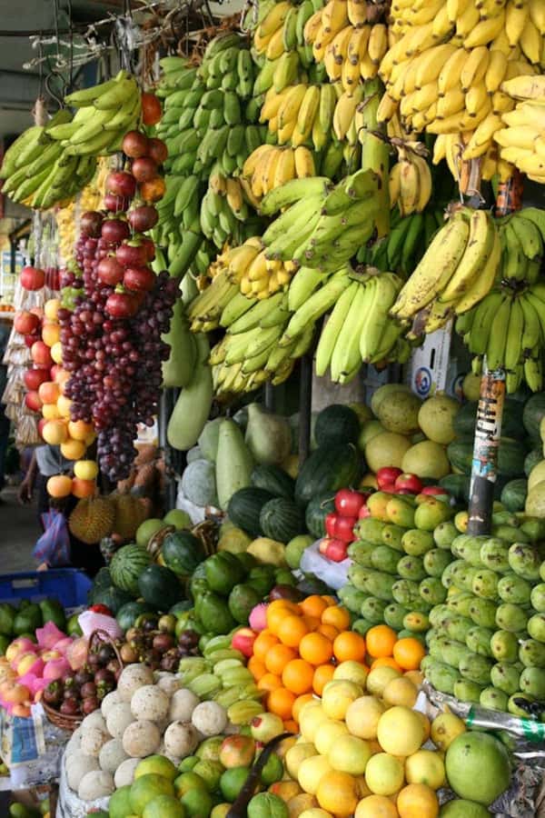 Authentic Kenyan Cooking Class & Market Tour in Nairobi - Buying ingredients in a Nairobi market