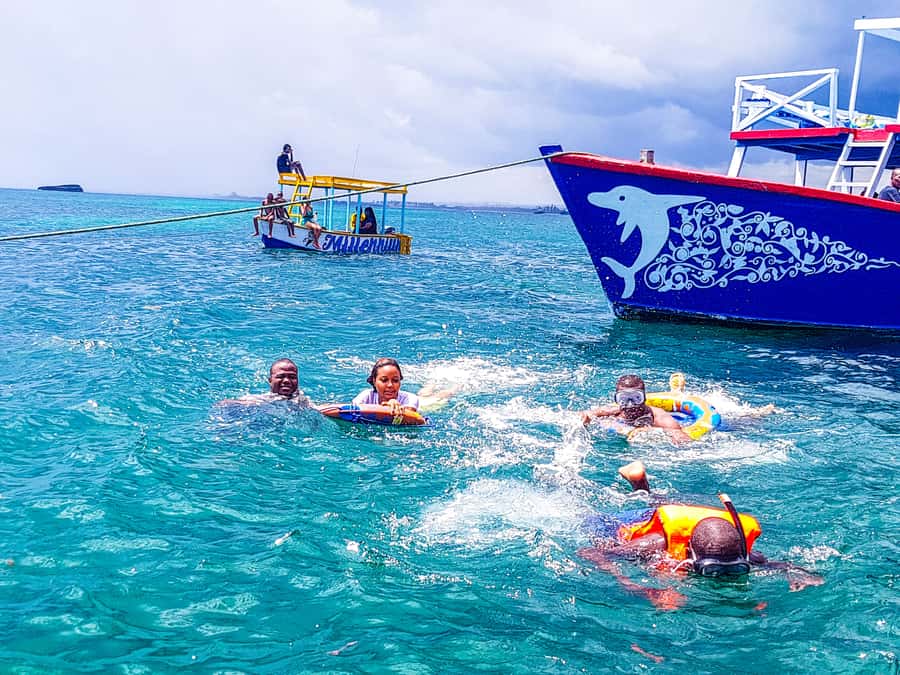 Blue Safari: Snorkeling at Watamu Marine Park & Seafood - Looking for dolphins from the boat
