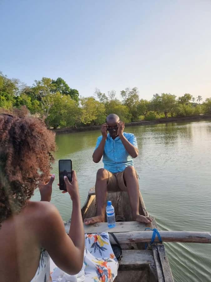 Diani Beach: Kongo River Estuary Sundowner Boat Tour - Boarding the canoe at the river mouth