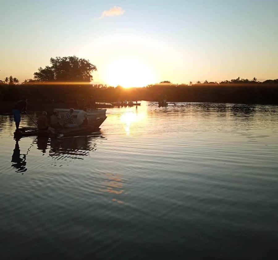 Diani Beach: Kongo River Sunset Experience in a canoe - Boarding a traditional canoe at the estuary