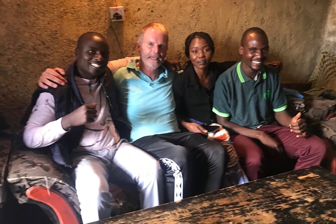 Kevins Kibera Slum Tours - The landfill and train track show the hard edges