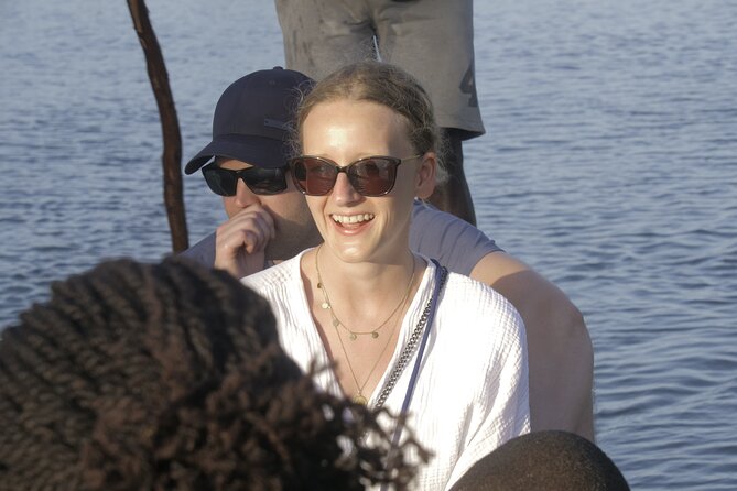 Kongo River Sunset Experience in Canoe - Boarding a traditional canoe at the estuary