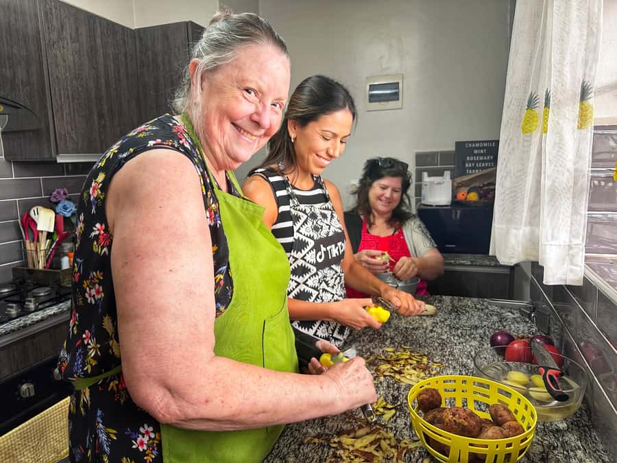 Local Market Tour and Traditional Meal Cooking Class - Sharing the meal at home