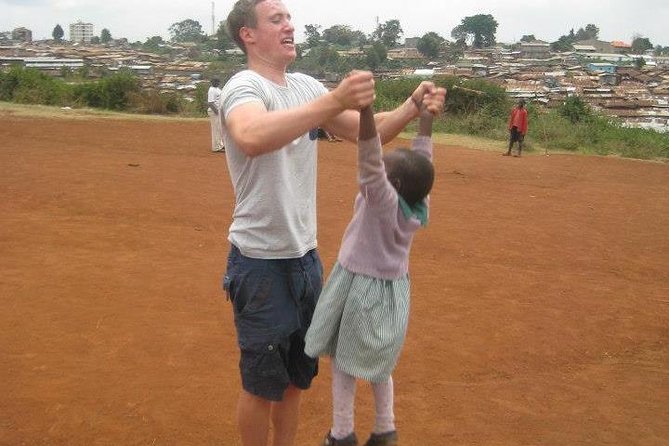 Nairobi Guided Tour to Kibera Slums - Nursery schools, water vendors, and shower shops