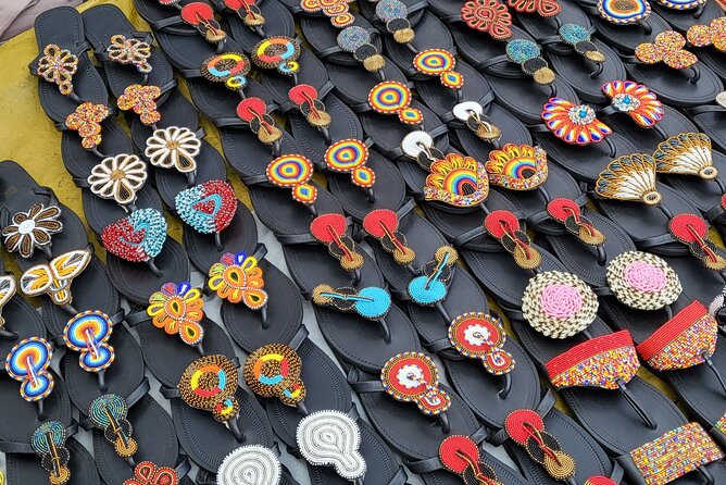 Souvenir Crafts, Fabric Shopping & Hair Braiding & City Tour - Choosing Ankara fabric and clothing