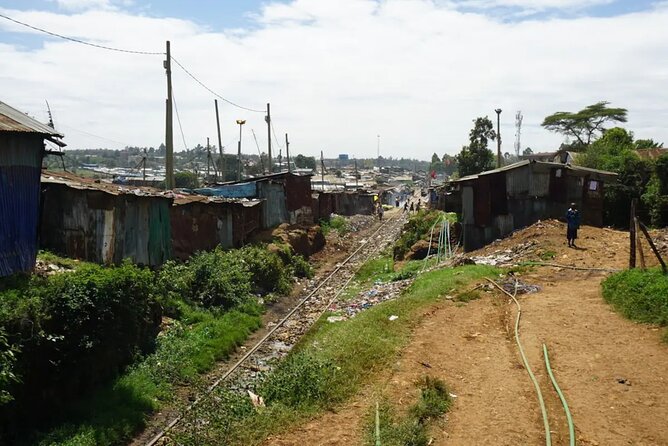 The Kibera Empowerment Walking Tour - Stop one: Moses’s home and the railroad tracks