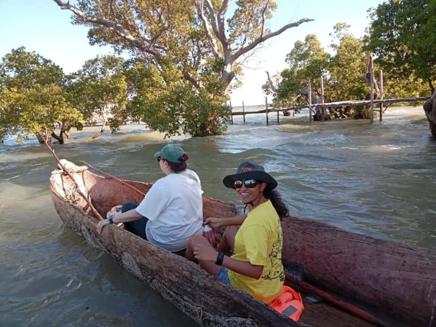 Watamu: Sunset Mangrove Canoe Tour with Coconut Drink - Walking into Mida Creek at low tide